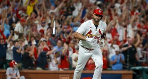 Albert Pujols hits 698th homer, helps Cards beat Reds 6-5