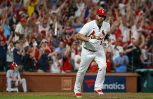 Albert Pujols hits 698th homer, helps Cards beat Reds 6-5