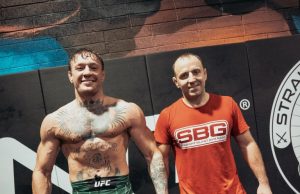 Conor McGregor shows off stunning seven-year body transformation as his veins pop out of bulging biceps in latest pic