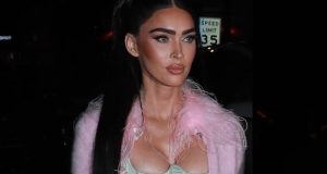 See Megan Fox’s Latest Barbiecore Outfit With a Fuzzy Pink Sweater and Corset