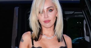 Miley Cyrus Looks Stunning in Gucci Corset and Leather Skirt