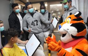 UCLA football team visits patients at Las Palmas