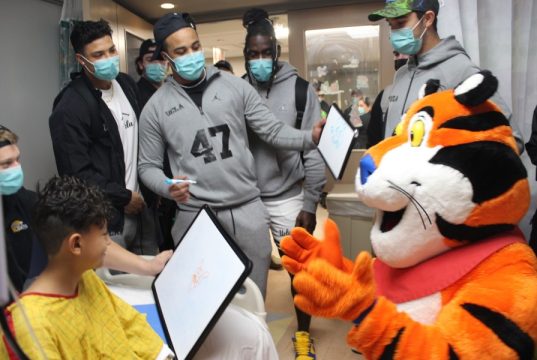 UCLA football team visits patients at Las Palmas