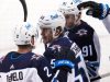 McDavid scores two birthday goals, helps Oilers roll Sharks