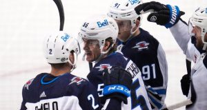 McDavid scores two birthday goals, helps Oilers roll Sharks