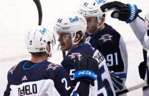 McDavid scores two birthday goals, helps Oilers roll Sharks