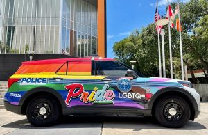 Op-Ed: Huh? Miami Cops Drive Clownish Rainbow-Colored LGBTQ Cruiser While on Duty