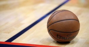 Assistant basketball coach, 22, accused of posing as 13-year-old player during game